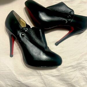 Christian Louboutin Black Leather Booties with Iconic Red Soles